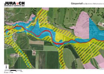 Carte de dangers des inondations de la Scheulte à Vicques, quartier Es Montes (rouge : danger élevé, bleu : danger moyen, jaune : danger faible, hachure : danger résiduel) 